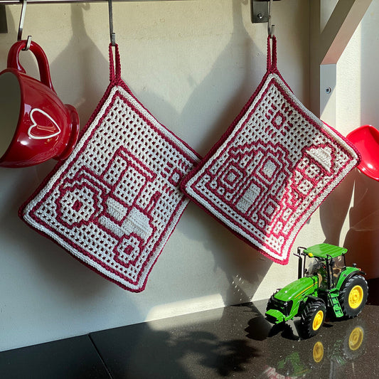 Astrids 2 pannenlappen met boerderijmotief