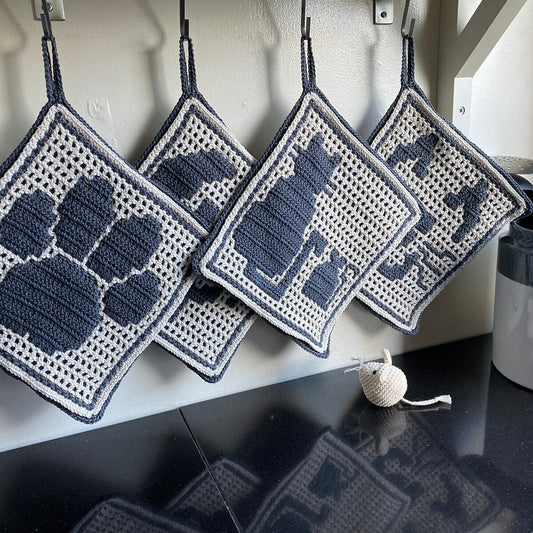 Astrids 4 pannenlappen met honden- en kattenmotief