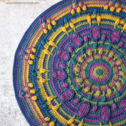 Kussen met pauwenstaartmandala