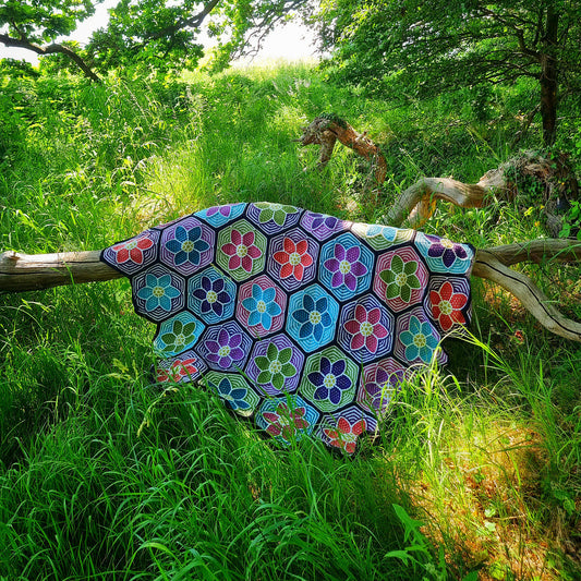 Mozaïekdeken met bloemenperk