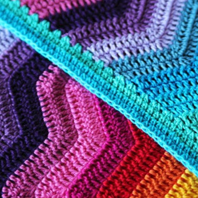 Babydeken met regenboogrimpels
