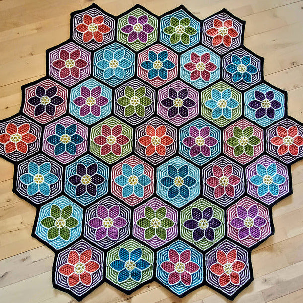 Mozaïekdeken met bloemenperk