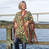 Ruana en sjaal van de voedselverzamelaar