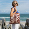 Tas/kussen met giraffenprint en verstoppertje-thema