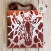 Tas/kussen met giraffenprint en verstoppertje-thema