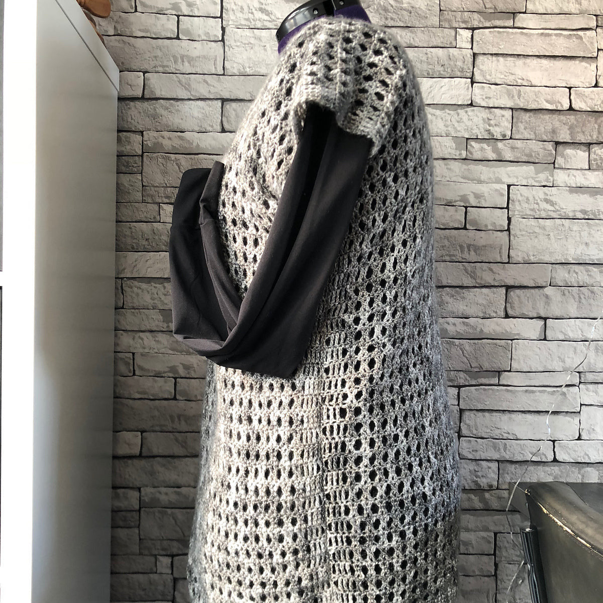 Mouwloos vest met bandjes