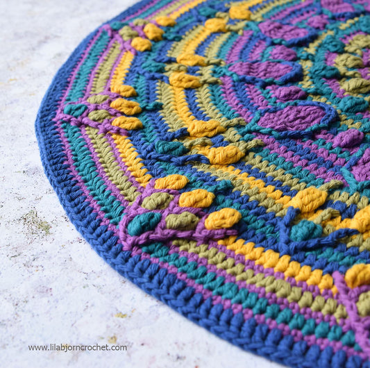 Kussen met pauwenstaartmandala