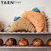 Cuddly Croissant Cushion