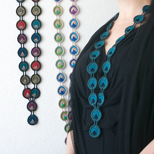 Pauwenoog ketting